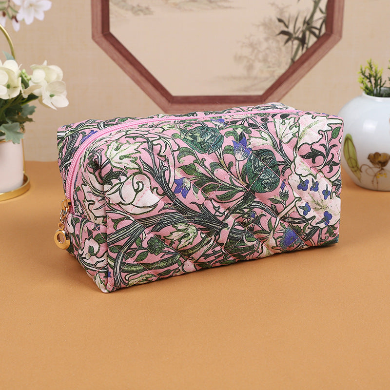 A521-AAAA Embossed small fresh lily flower cosmetic bag portable travel skin care storage bag