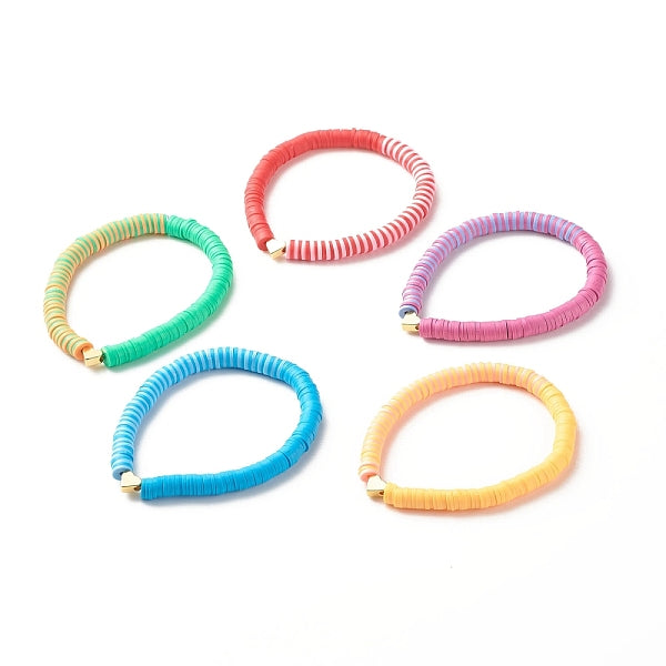 Bracciale elasticizzato surfer heishi in pasta polimerica con cuore in ottone