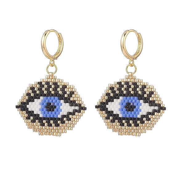 Boucles d'oreilles créoles pendantes œil de cheval tressées en graines de verre