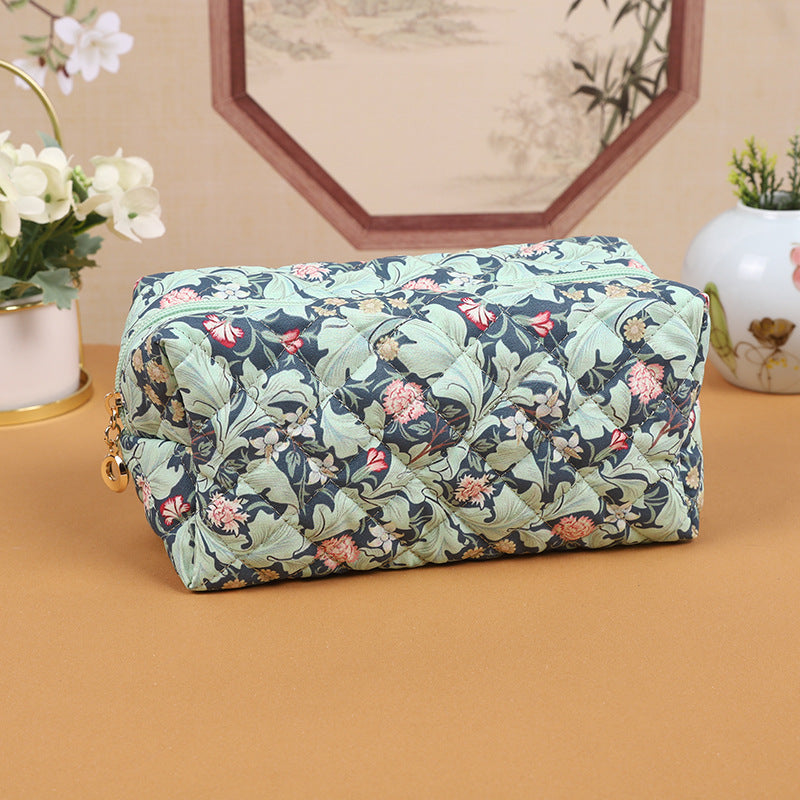 A522-AAAA Embossed small fresh lily flower cosmetic bag portable travel skin care storage bag