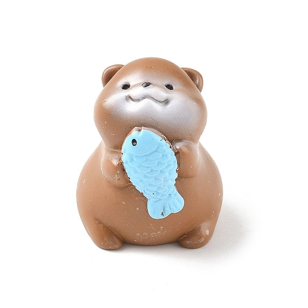 Figurines de loutre en résine avec ornement de poisson