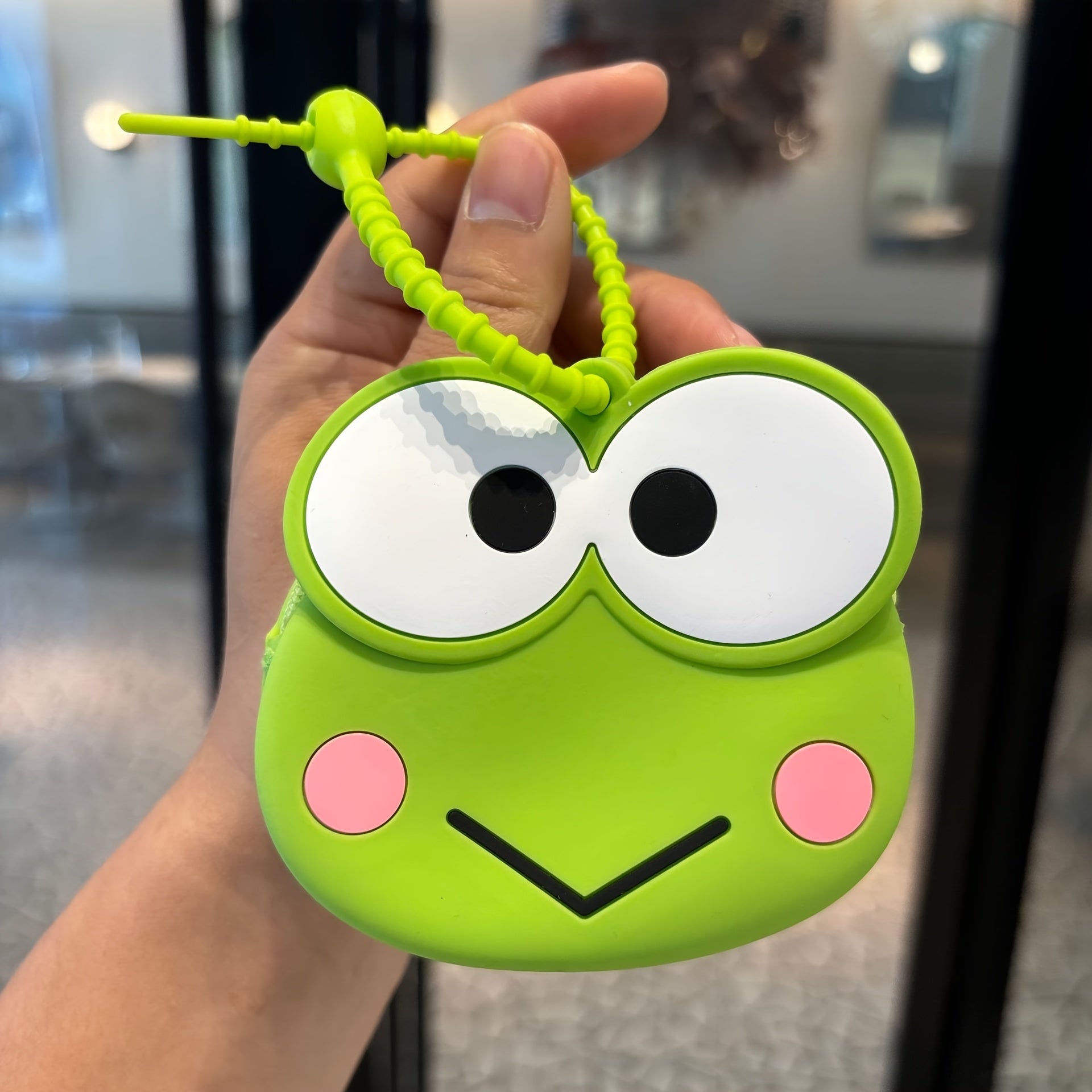 TEMU A Mini Silicone Bag With An Adjustable Strap, Perfect As A Coin Purse, Backpack Accessory, And Key Holder.