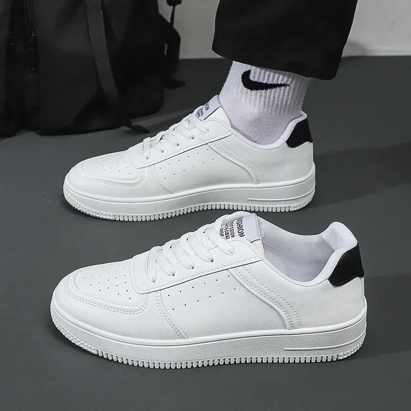 White Casual Shoes Lightweight Sneakers Breathable Tenis Sports Shoes Zapatillas Hombre Leather Men Skateboarding Shoes Flat 251009