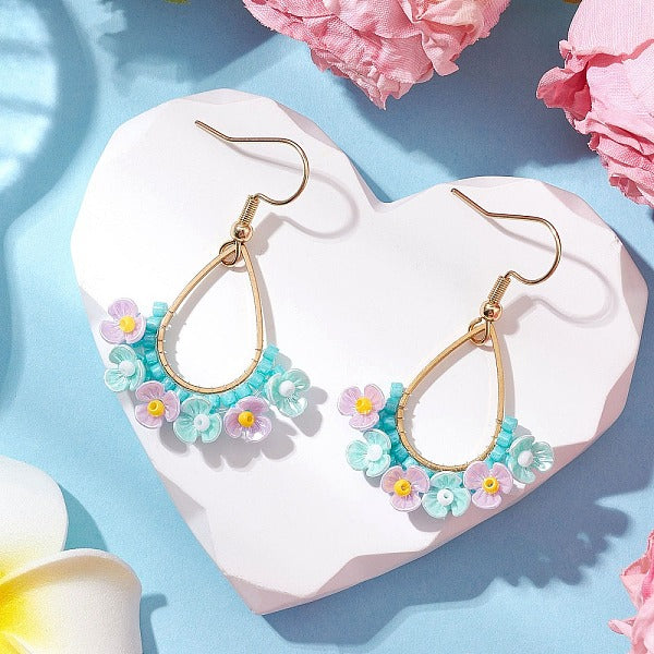 Boucles d'oreilles pendantes en forme de larme avec perles de verre et résine