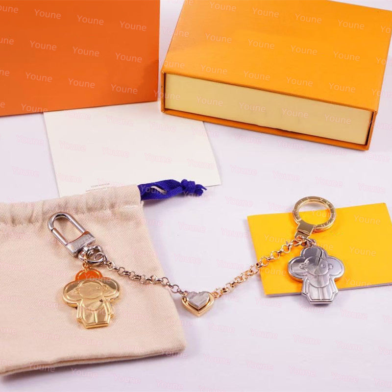 Designer VIVIE Bff Bag Charms Accessories sunflower Long Chain Gold Sliver Charms For Women Orichalcum Belt Chain Golden Bean Turnbuckle Retro Bag C