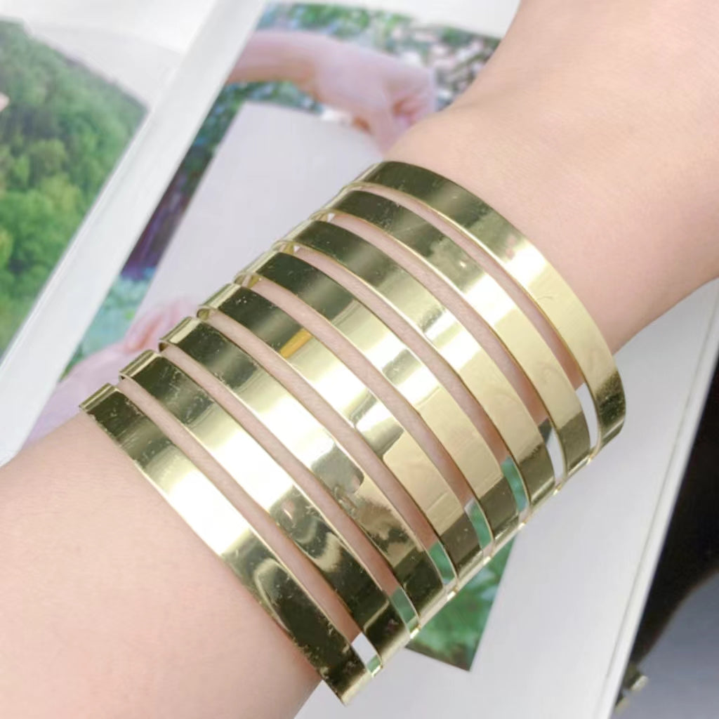 Elegant Metal Circular Pattern Bracelet - Modern Edgy Wide Band Jewellery Perfect for Urban Wear