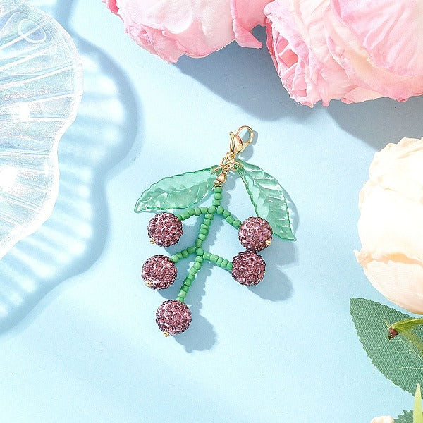 Decorazioni pendenti a forma di frutta con perline di vetro e strass in pasta polimerica