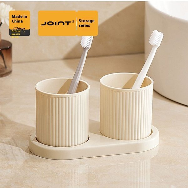 Cream style toothbrush rack, bathroom sink, mouthwash brushing cup, dental utensils countertop, storage tray