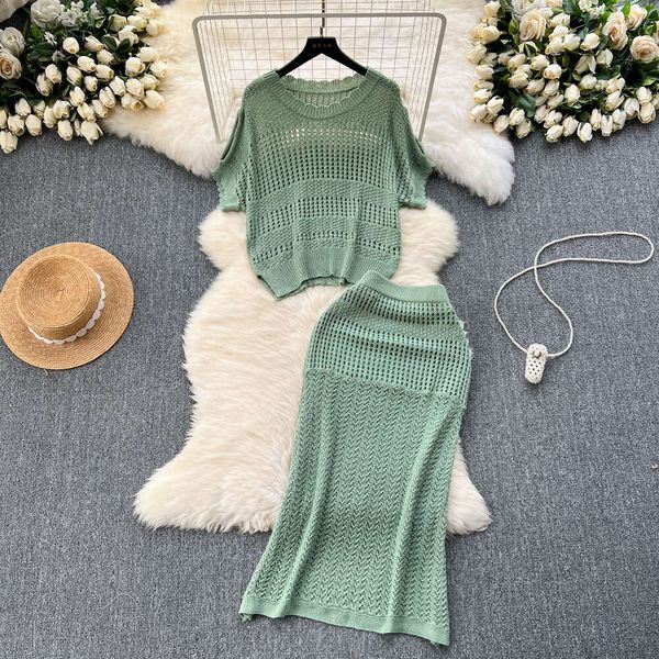 Wearing a full set of design inspired hollowed out knit tops for summer loose and versatile half skirts for casual two-piece sets trendy
