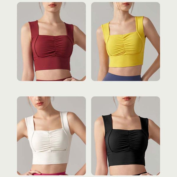 Colete de ioga feminino Sports Bra Slim Fit Fits Roupas de ioga Roupas de cor sólida colorida de moda de moda superior sem mangas de moda ve