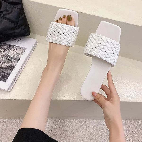 New designer women&#039;s temperament woven soft leather cross strap open toe flat slippers wear vacation beach sandals