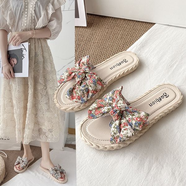 Slippers for women to wear in summer. Versatile fairy style sweet bow flat bottomed beach sandals
