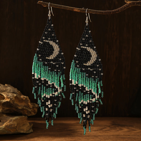 Boucles d'oreilles pendantes faites à la main en perles de verre à motif de lune de style bohème pour femmes