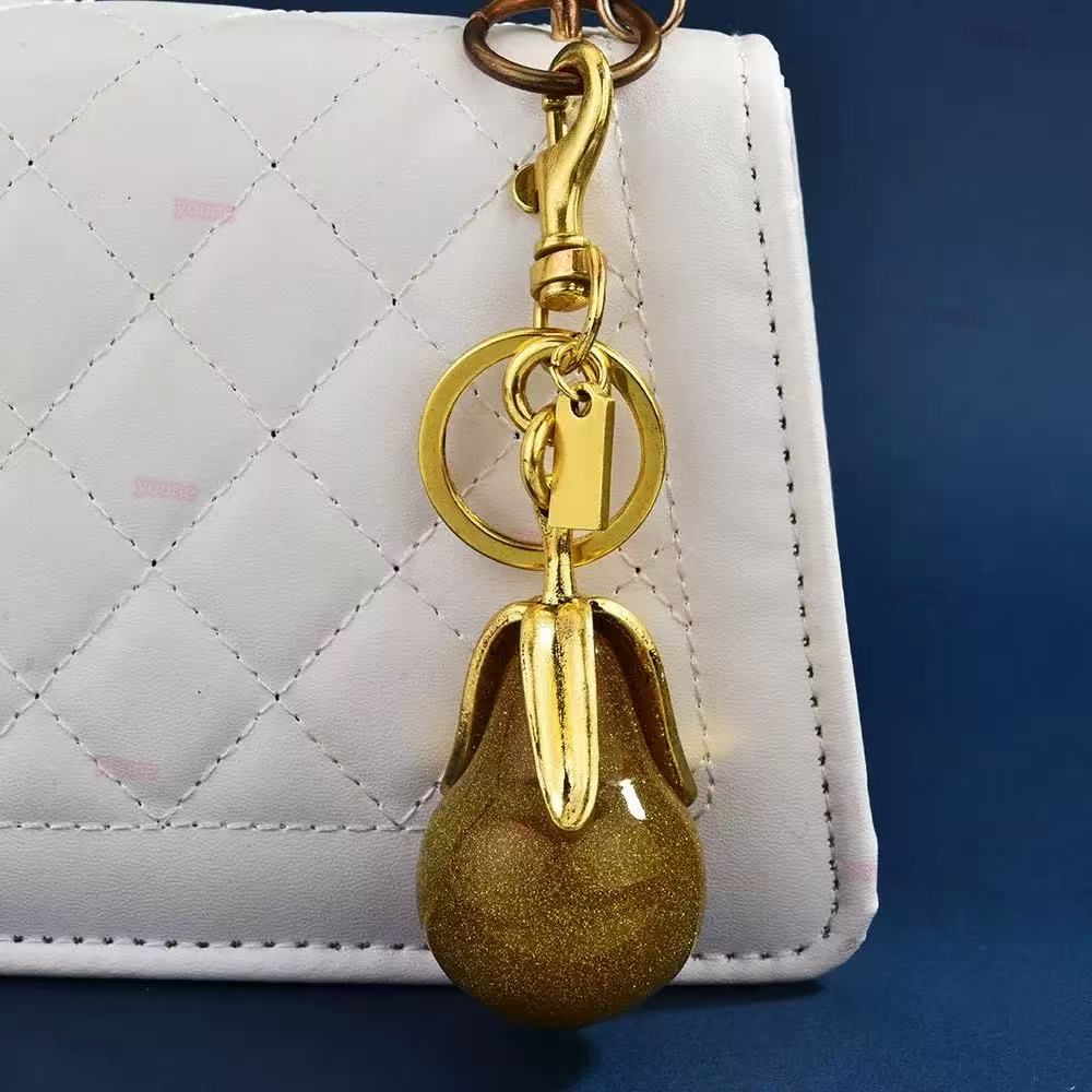Pear apple bag Charm pretzel Women Letter Designer Keychain Co ch Cherry Keychain Bag Charm Decoration Accessory Key Rings Cherry Resin Lanyards