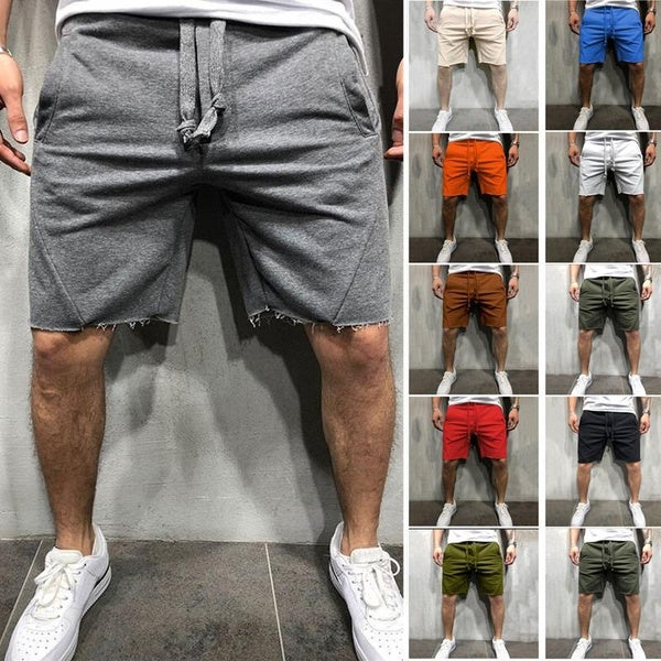 2023 Nouvelle mode d'été hommes couleur unie ourlet effiloché Shorts Hip Hop Streetwear hommes gymnases Fitness cordon de serrage court pantalons de