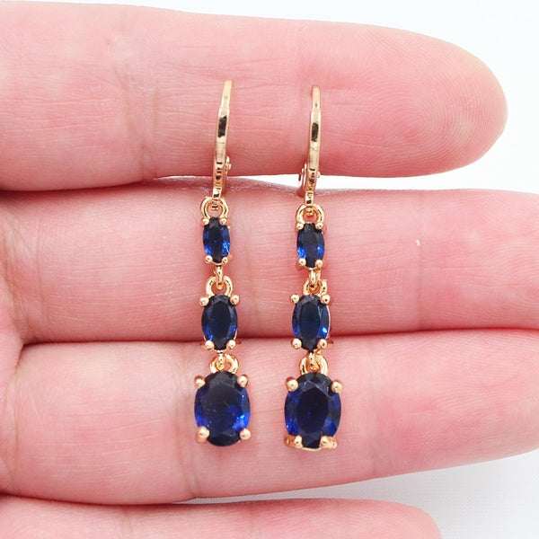 Boucles d'oreilles pendantes en zircone cubique ovale bleue pour femme