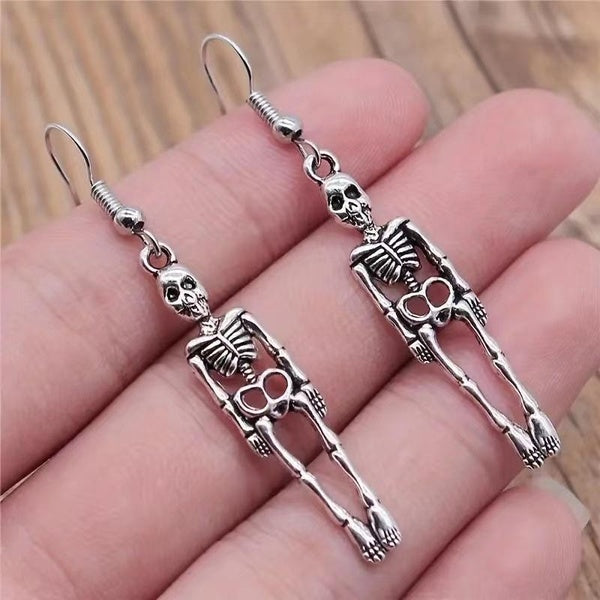 1 paire de boucles d'oreilles pendantes tête de mort vintage - Parfaites pour les hommes et les femmes, le hip-hop et les décorations d'Halloween!