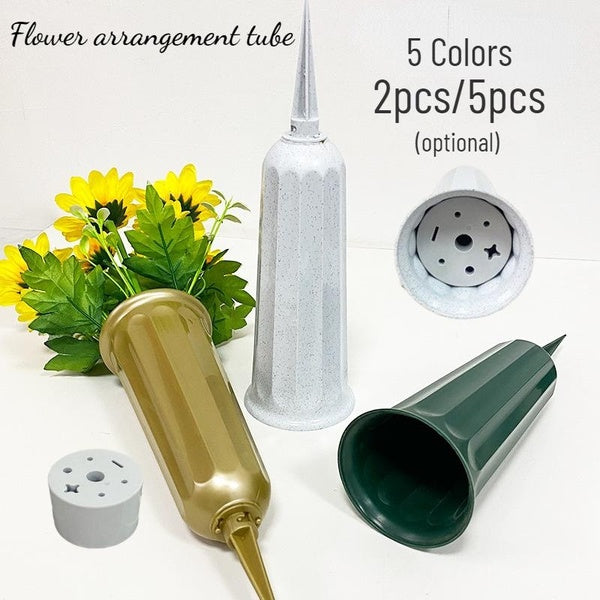Scene layout: simple flower tube and pot, plastic flower tube in cemetery, outdoor lawn flower arrangement for family gardening, cemetery ancestor wo