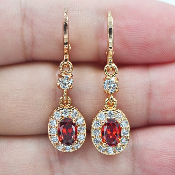 Boucles d'oreilles pendantes de mariage ovales en zircone cubique rouge pour femmes