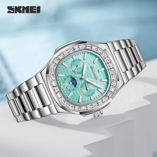 SKMEI 7076 Montre à quartz de luxe pour homme, étanche, avec cadran ovale, boîtier en métal, bracelet en métal, design pour femme
