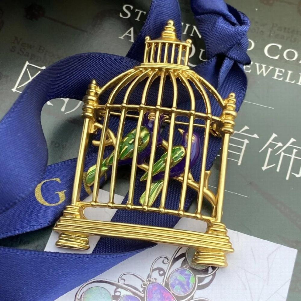 Medieval vintage and vintage enamel birdcage brooch