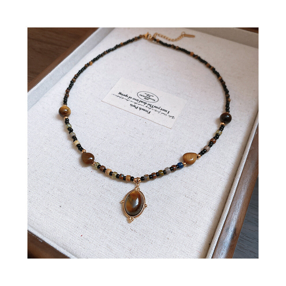 (Titanium steel water-dropped tiger's eye stone rice bead necklace) Titanium steel natural stone pearl sun necklace, retro ethnic style, niche collarb