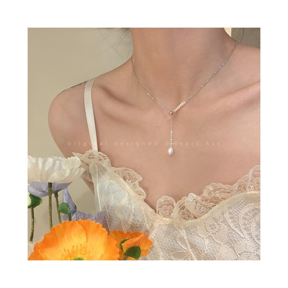 (X1089 Silver # Irregular Pearl pendant) This high-end, light luxury necklace features a spicy girl pearl collarbone chain with a fashionable and vers