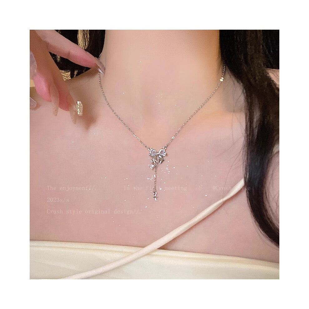 (X1173 Silver # Bow Zircon Tassel Necklace) This high-end, light luxury necklace features a spicy girl pearl collarbone chain with a fashionable and v