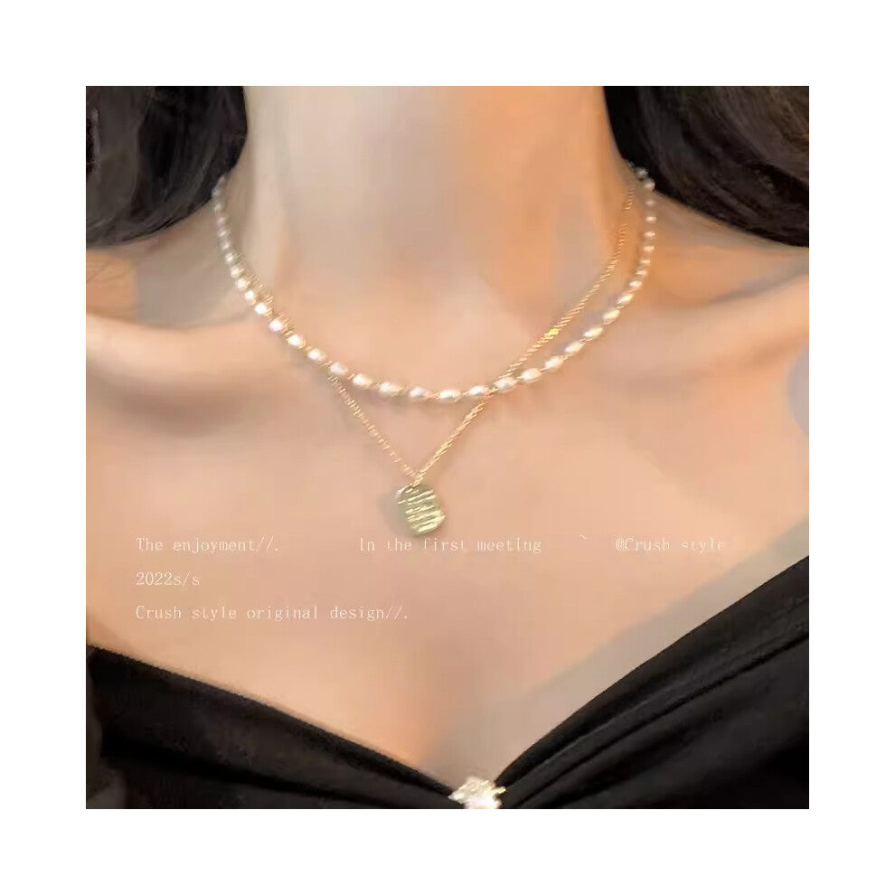 (X1525 Gold # Millet Pearl Necklace) This high-end, light luxury necklace features a spicy girl pearl collarbone chain with a fashionable and versatil