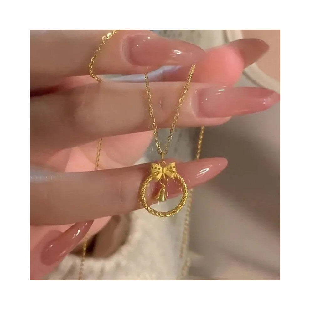 (XL540) The golden brushed and hollowed-out four-leaf clover necklace exudes an exquisite and high-end feel. The titanium steel collarbone chain does