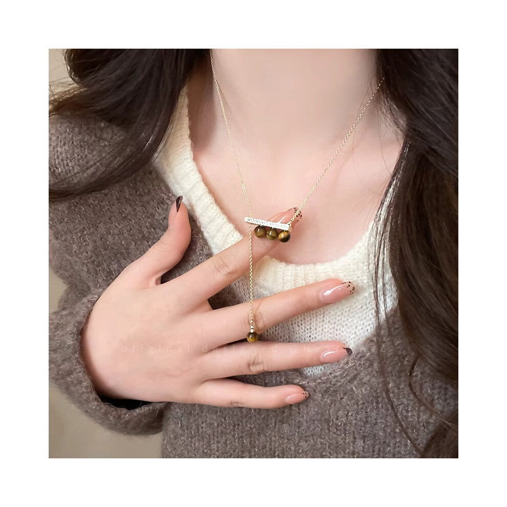 (19# Golden Tiger's Eye Necklace) Tiger's eye necklace, women's light luxury and high-end style, long collarbone chain, versatile hoodie and sweater c