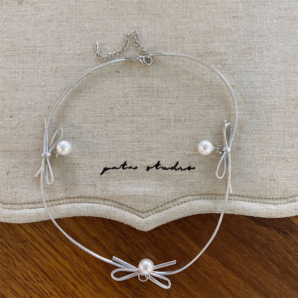 (Pearl Silver Bow Necklace) New imitation pearl silver bow necklace fashionable niche design clavicle chain versatile necklace