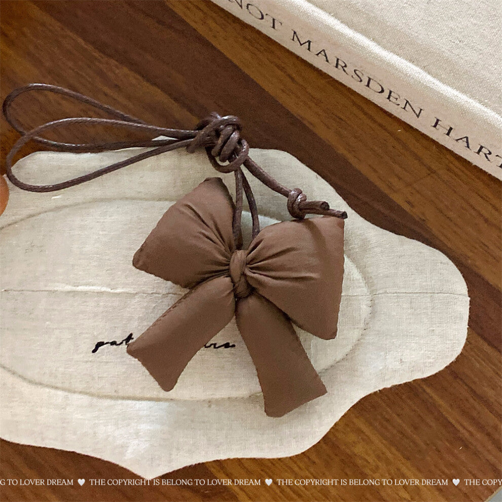 (Light brown bow leather cord necklace) New Maillard coffee color cotton-filled bow leather rope necklace cute adjustable lanyard necklace for women