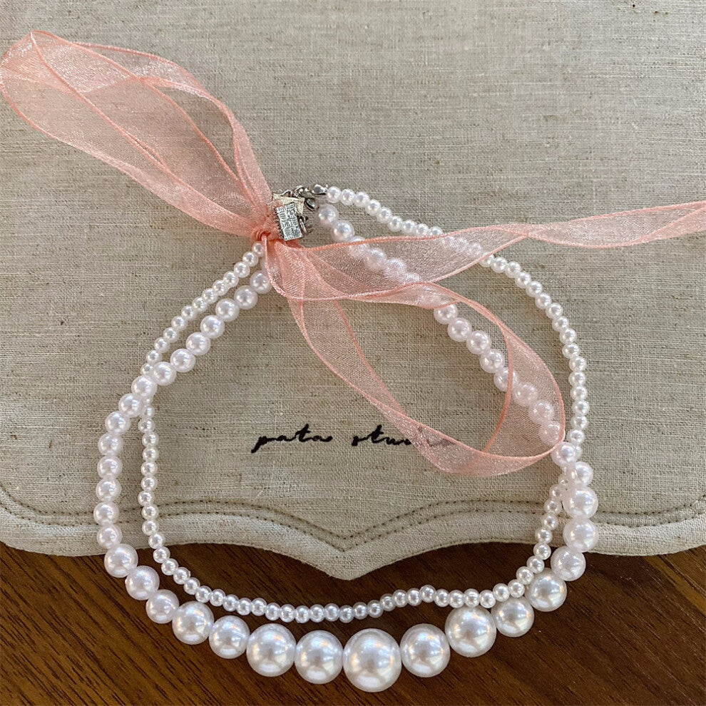 (Pink Ribbon Double Pearl Necklace) New black pearl beaded bow necklace fashionable niche design clavicle chain versatile necklace