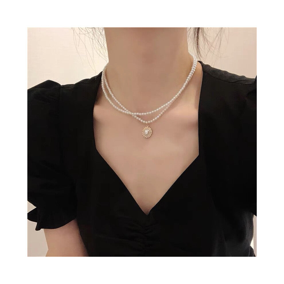 (MY32642) Ins-style pearl necklace, a versatile and niche design for women, exudes a sense of high-end luxury. Collarbone chain, heart-shaped pendant