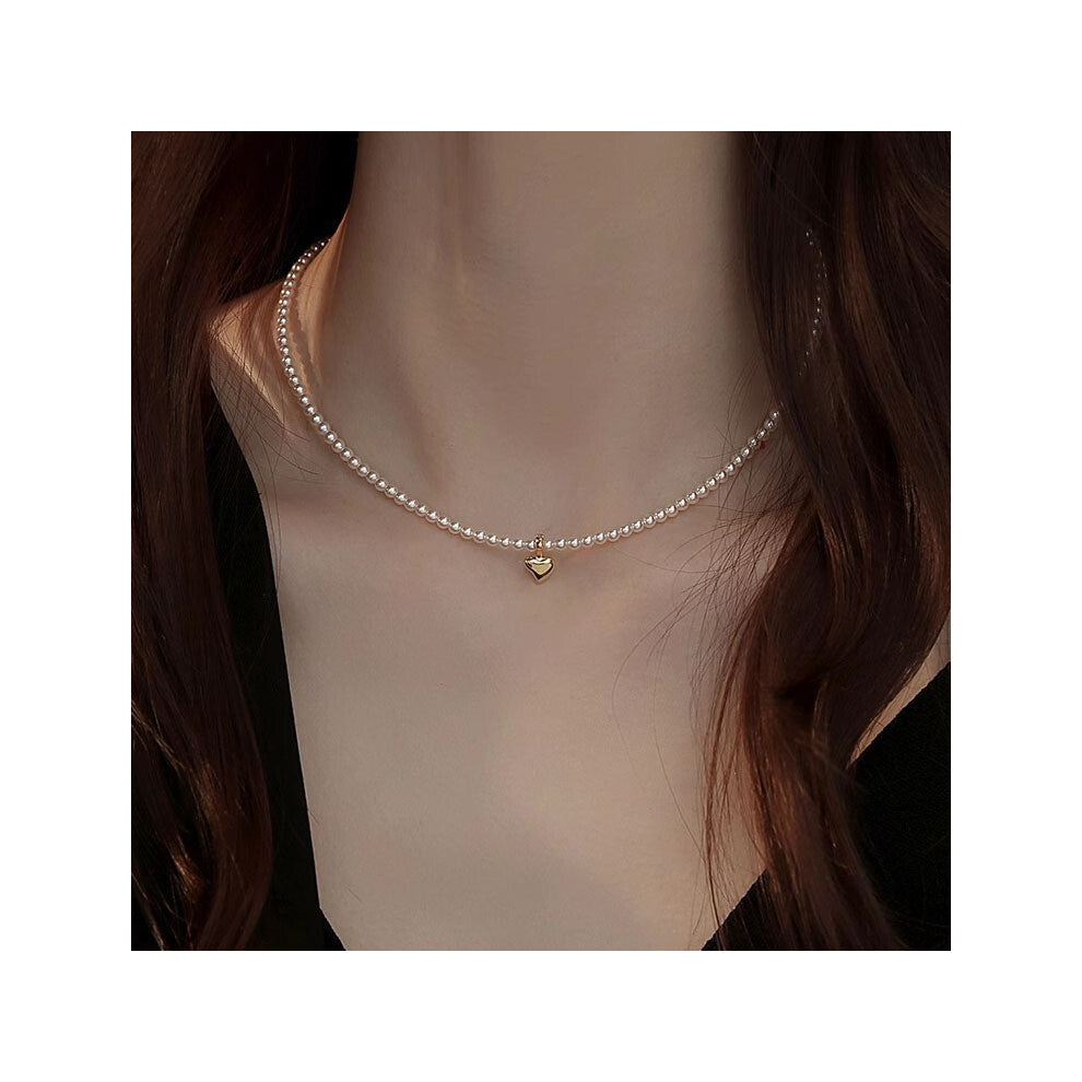 (MY35578) Ins-style pearl necklace, a versatile and niche design for women, exudes a sense of high-end luxury. Collarbone chain, heart-shaped pendant