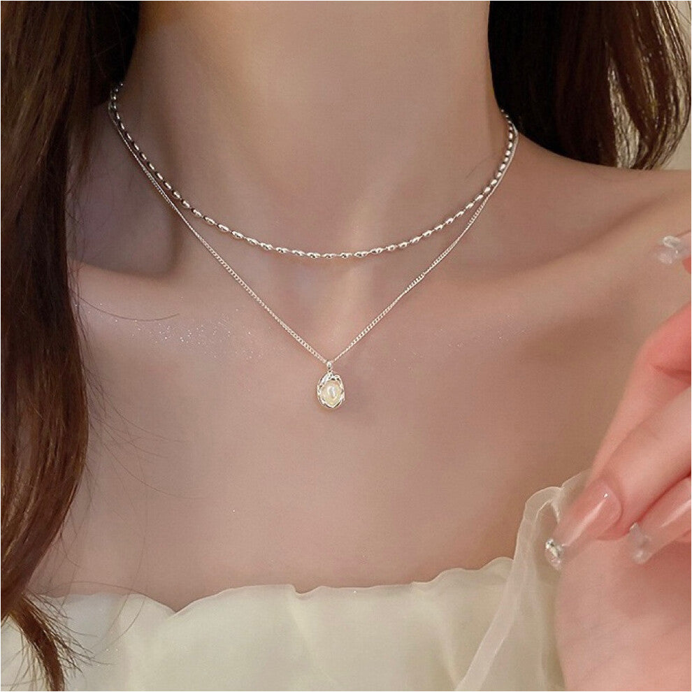 (MY35649) Ins-style pearl necklace, a versatile and niche design for women, exudes a sense of high-end luxury. Collarbone chain, heart-shaped pendant