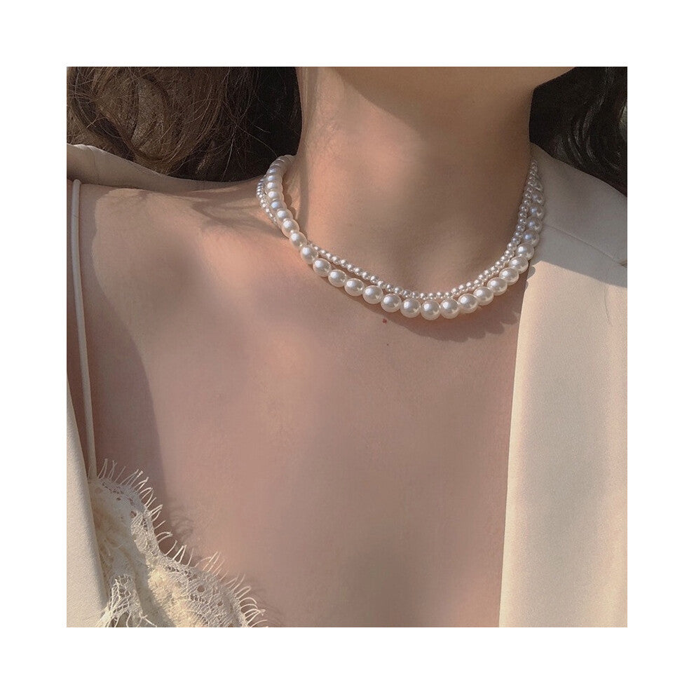 (MY31193) Ins-style pearl necklace, a versatile and niche design for women, exudes a sense of high-end luxury. Collarbone chain, heart-shaped pendant