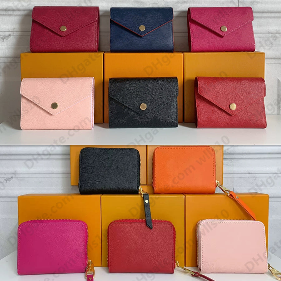 Luxurys designer wallet women credit card holders High Quality genuine leather Fashion Embossed Monograms Empreinte Classic zipper cardholder Short