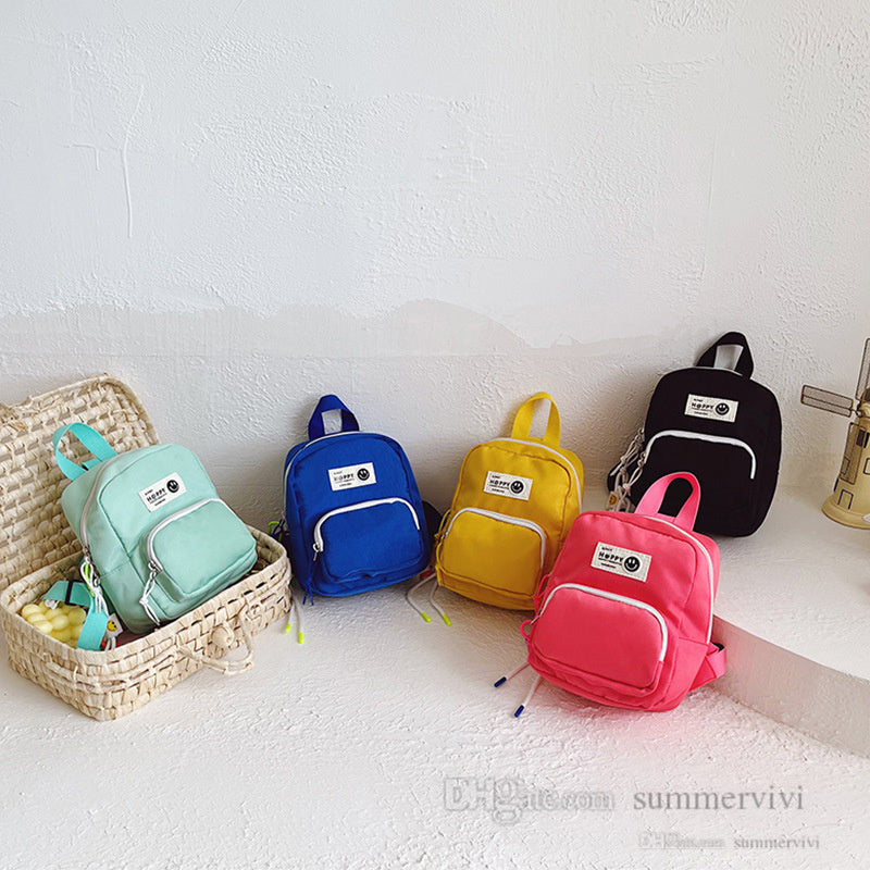 Baby kids letter backpacks girls boys candy color Anti-lost nylon double shoulder bag children cool school bag Q7584