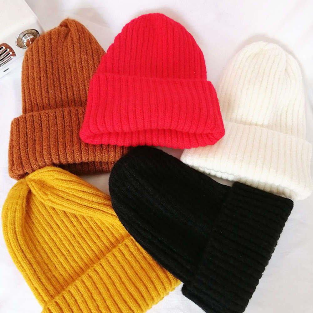 Hat female winter Korean warm wool student solid color casual knitting pointed cap ear protection hat