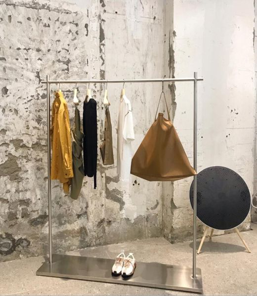 Clothing store display rack Commercial Furniture women&#039;s side cloth hangers stainless steel bottom box middle island clothes hanger rod