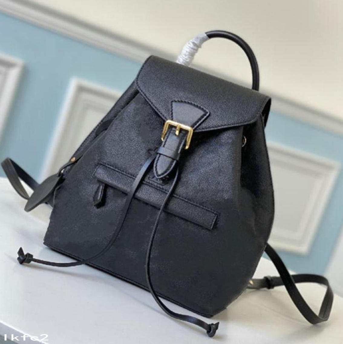 fashion luxury Women Backpacks brand School Bags Back Packs ladies Students Crossbody String Bucket Shoulder Bag with Embossed Flowers Tag Purses L2