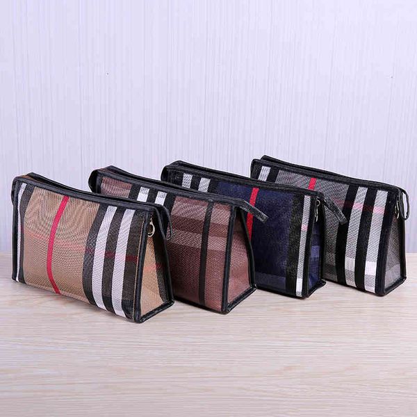 Cosmetic Bags Handbagsthe Makeup Pu Lattice Storage Will Hand in to Take the Travel , Wash and Taobao