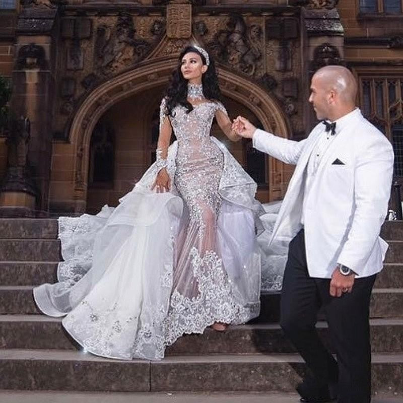 2020 Luxurious Rhinestone Crystal Wedding Dresses High Neck Beads Applique Long Sleeves Mermaid Bridal Dress Dubai Wedding Gown Overskirt