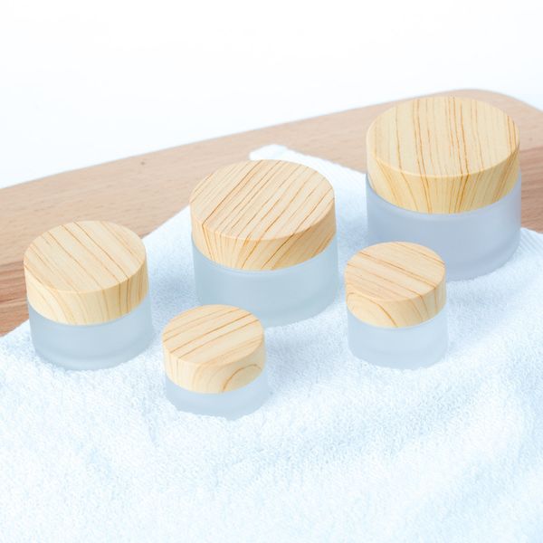 Frosted Glass Jar Cream Bottles Round Cosmetic Jars Hand Face Packing Bottles 5g 10g 15g 30g 50g Jars With Wood Grain Cover Hot