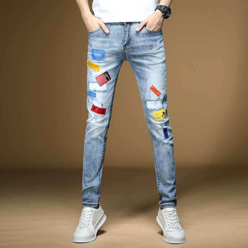 Popular logo badge biker jeans for men hip hop man stretch torn hole ox his pants slim small feet youth thin pants rock revival true brand