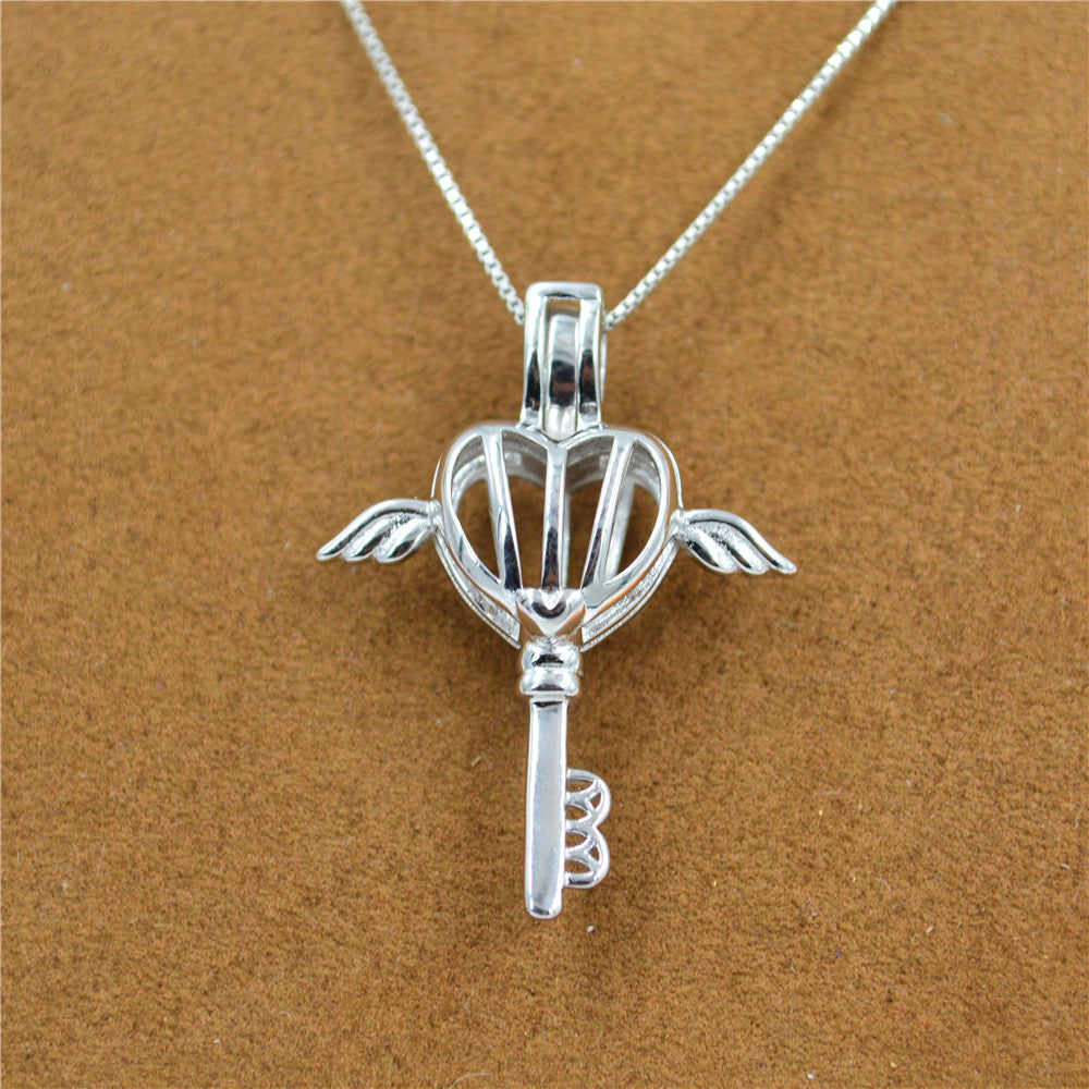 Cross-border hot selling ball cage Pendant DIY accessories S925 Sterling Silver Pendant Angel magic box movable button manufacturers DZ052