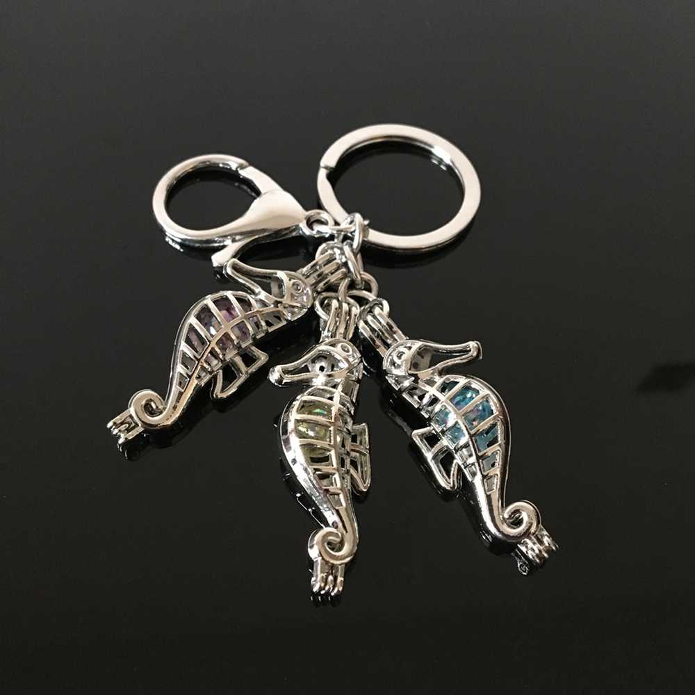 Euramerican seahorse pearl cage key ring can open hollow noctilucent volcanic stone pendant keyring