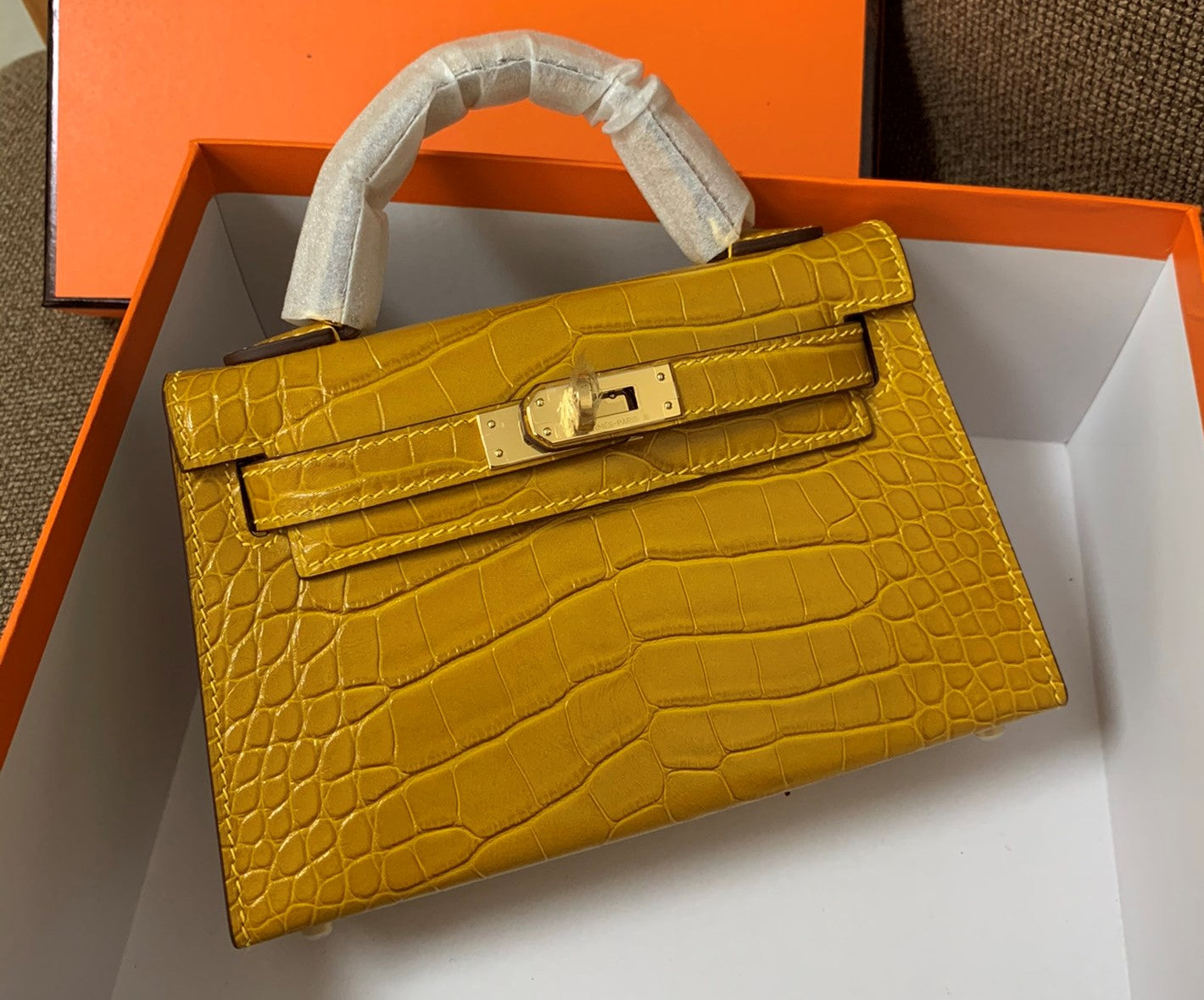 whosale handmade calf skin with crocodile grain yellowmini handbag19cm,wax thread,have gold and silver hardware,contact me for details